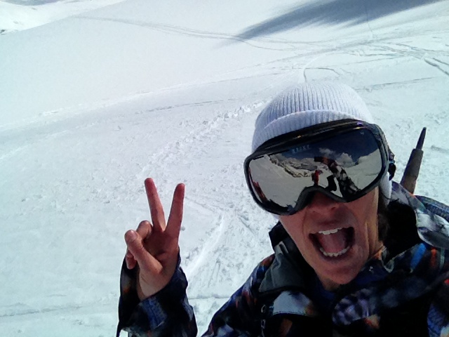 Tammy stoked on an awesome day of springtime snowboarding!