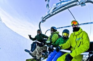 family snowboard chairlift