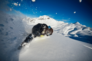 Snowboarder finding fresh powder